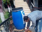 تعقيم الموظفين والمواطنين قبل دخول مكاتب الخدمة فى أبوكبير  بالشرقية.. صور 