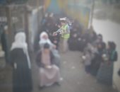 توزيع عصائر على المترددين على مكاتب البريد فى قرية الرمادة بالقليوبية