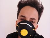 أحمد يشارك صورته بالجوانتى والكمامة ضمن مبادرة اليوم السابع للوقاية من كورونا