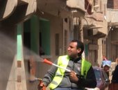صور.. تطهير شوارع قرية دنوشر بالغربية للحد من انتشار كورونا