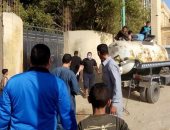 شباب قرية ذات الكوم فى حملة تطهير وتعقيم للقرية