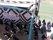 أهالى قرية أبا بالمنيا يطهرون وينظمون أماكن صرف المعاشات لتقليل التكدس