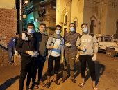 حملة شبابية لتطهير وتعقيم كفر أباظة بالزقازيق للحد من انتشار كورونا