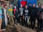 أهالى قرية منية الحيط بالفيوم يطهرون الشوارع للوقاية من فيروس كورونا