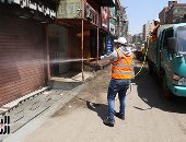 محافظة الجيزة تطهر الشوارع لمنع انتشار فيروس كورونا 