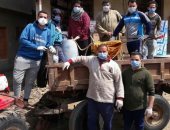 أهالى قرية زاوية الناعورة بالمنوفية يعقمون الشوارع للوقاية من كورونا