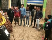 أهالى قرية المعالى بالشرقية يطهرون الشوارع للوقاية من فيروس كورونا