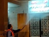 صور.. تعقيم وتطهير الشوارع والمبانى بمراكز المنيا للوقاية من "كورونا"