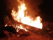 صور.. حرق نعش مستخدم فى نقل جثة متوفاة بكورونا فى الغربية بعد تشييع الجنازة