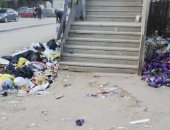 سكان المطرية يشكون انتشار القمامة بجوار كوبرى المشاة