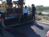 صور.. رفع كفاءة الطرق بحى العامرية غرب الإسكندرية