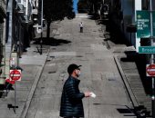 كورونا × صور.. فتح المدارس فى الدنمارك والفيروس يتفشى فى ولايات أمريكا 