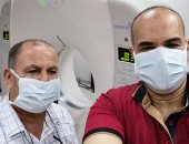  الجيش الأبيض.. "محمد" وصديقه كارم على خط مواجهة كورونا فى المنصورة  