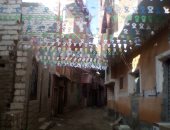 صور.. زينة رمضان تملأ شوارع القرى فى المنيا وتتحدى كورونا 