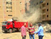 محافظة الجيزة ترفع 200 طن مخلفات من منطقة المعسكر بأوسيم.. صور