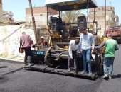 صور.. تنفيذ خطة الرصف بأحياء غرب الإسكندرية لتحقيق السيولة المرورية