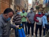 فض السوق وتطهير وتعقيم منازل ومنشأت حكومية بحى الحسينية بالزقازيق.. صور