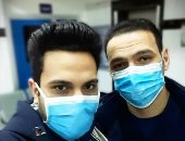الجيش الأبيض.. "أبانوب"و "إبراهيم" من تمريض مستشفى السنبلاوين فى مواجهة كورونا  