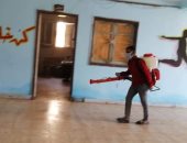 شباب قرية كفر بهوت يعقمون الشوارع للحد من انتشار  كورونا