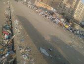 شكوى من انتشار القمامة بجوار دائرى سلم حى الهرم بالجيزة