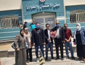 زيارة تضامنية بالورود للجيش الأبيض بمستشفى العريش 