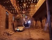 بهجة رمضان.. عمرو يشارك بصور لتزيين شارع الشيخ عثمان بقنا