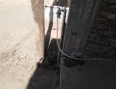 قارئ يشكو من ملاصقة عمود كهرباء لمنزله في نجع ساقية القاضى مركز نقادة