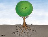 كاريكاتير صحيفة كويتية.. كورونا شجرة ثبتت جذورها فى الأرض