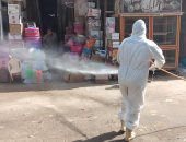 محافظة الجيزة تعقم شوارع 8 أحياء ومركز ومدينة ضد كورونا.. صور