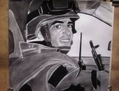 سيبها علينا.. عادل يبدع فى موهبة الرسم ويهدى لوحة إلى روح الشهيد المنسى