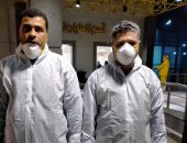 الجيش الأبيض.. "مصطفى" و "عادل" ينقلان مصابى كورونا لمستشفى العزل بالعجمى