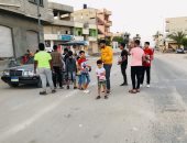 أطفال العريش يوزعون الإفطار على الصائمين ويهدون الثواب للشهيد المنسى ورفاقه