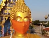 حتى بوذا لبسوه كمامة.. معبد فى بانكوك يحث المواطنين على الوقاية من كورونا