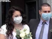 الحب أقوى من الفيروس.. زفاف بالكمامات فى إيطاليا.. فيديو