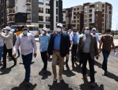 وزير الإسكان فى رسالة للعمال بدمياط الجديدة: بجهودكم تبنون مصر 