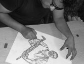 قارئ يشارك برسومات فنية للشهيد المنسى تبرز موهبته فى الرسم