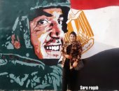 صور ..جرافيتى "المنسى" و "مجدى يعقوب" بجوار فنار المكس بالإسكندرية