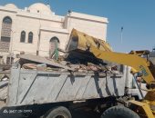 إخلاء سوق عشوائى بالسيدة زينب وتطهير المنطقة.. صور 