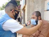 شباب مركز ههيا بالشرقية يوزعون المطهرات والكمامات على الأهالى