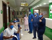 صور.. مستشفى إسنا للحجر الصحى تعلن خروج 10 حالات بعد شفائهم من كورونا
