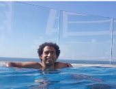 علي ربيع بصورة قديمة فى البحر: من الصيف اللي فات عشان الصيف ده مات