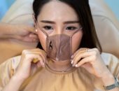"مينى ماسك"..شاهد شكل الكمامات فى عيادات التجميل بتايلاند للحماية من كورونا