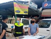 تغريم 43 سائق لعدم ارتداء الكمامة الواقية بالشرقية.. صور