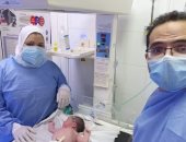 صور.. إجراء ولادة قيصرية لمصابة بكورونا فى مستشفى ناصر ببنى سويف