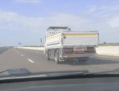 شكوى من سير سيارات النقل الثقيل فى الحارة غير المخصصة لها بمحور 30 يوينو