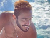 استمر بالابتسامة.. كهربا يستمتع بأجازته فى البحر خلال توقف الدورى