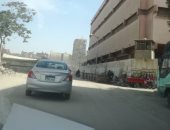 قارئ يشكو إضاءة أعمدة الإنارة نهارا بشارع ترعة الزمر بالعمرانية  