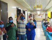 خروج 22 حالة عقب تعافيهم من كورونا بمستشفى إسنا للحجر الصحى.. صور
