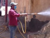 صور .. تطهير قرية اليمن بالعامرية بعد ظهور حالات إصابة بـ "كورونا"