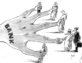 كاريكاتير صحيفة إماراتية.. البنوك تتحكم فى حياة البشر